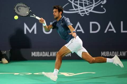 (181229) -- ABU DHABI, Dec. 29, 2018 (Xinhua) -- Novak Djokovic of Serbia returns to Karen Khachanov of Russia during the 2018 Mubadala World Tennis Championship in Abu Dhabi, the United Arab Emirates (UAE), on Dec. 28, 2018. Novak Djokovic won 2-0. (Xinhua Mahmoud Khaled) (SP)UAE-ABU DHABI-TENNIS-MUBADALA WORLD TENNIS CHAMPIONSHIP 