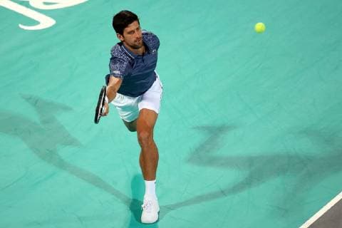 (181229) -- ABU DHABI, Dec. 29, 2018 (Xinhua) -- Novak Djokovic of Serbia returns to Karen Khachanov of Russia during the 2018 Mubadala World Tennis Championship in Abu Dhabi, the United Arab Emirates (UAE), on Dec. 28, 2018. Novak Djokovic won 2-0. (Xinhua Mahmoud Khaled) (SP)UAE-ABU DHABI-TENNIS-MUBADALA WORLD TENNIS CHAMPIONSHIP 