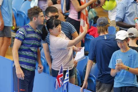 29th December 2018, RAC Arena, Perth, Australia; Hopman Cup Tennis, sponsored by Mastercard; Cameron Norrie of Team Great Britain takes selfies with fans after winning his match against Stefanos Tsitsipas of Team Greece  ActionPlus12091011 DavidxWoodley
