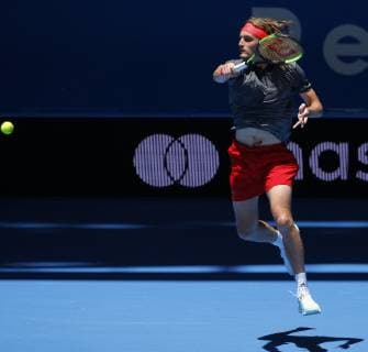 29th December 2018, RAC Arena, Perth, Australia; Hopman Cup Tennis, sponsored by Mastercard; Stefanos Tsitsipas of Team Greece follows through on a forehand shot against Cameron Norrie of Team Great Britain  ActionPlus12091001 DavidxWoodley