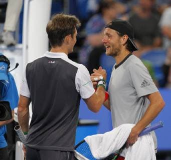 29th December 2018, RAC Arena, Perth, Australia; Hopman Cup Tennis, sponsored by Mastercard; Lucas Pouille of Team France congratulates Matt Ebden of Team Australia after he won their match 2 sets to 1  ActionPlus12091210 DavidxWoodley