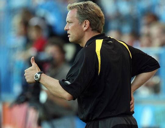 Aachen s coach Dirk Bremser reacts during the first round German Soccer Cup match between fourth division team Chemnitzer FC and first division team TSV Alemannia Aachen at the soccer stadium in Chemnitz eastern Germany Sunday Sept 10 2006 Eckehard Schulz CHEMNITZ DEU