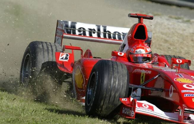Germany s Formula One driver Michael Schumacher leaves the A1 race track during the free practice of the Austrian Formula One GP in Spielberg Austria Saturday May 17 2003 Eckehard Schulz SPIELBERG AUT