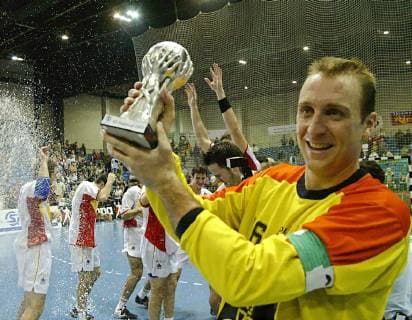 The Spanish national goalkeeper David Barrufet presents the trophy after the victory of his team in the final of the Handball Supercup Germany against Spain in Riesa on Sunday 2 Nov 2003 Eckehard Schulz Spains goalkeeper David Barrufet shows the cup after his team won the final match against Germany at the Handball Supercup tournament in Riesa eastern Germany Sunday Nov 2 2003 Eckehard Schulz RIESA DEU