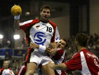 The German Daniel Stephan 18 in the goal throw against the Croats Niksa Kaleb and Ivano Balic right in the first semi final Germany against Croatia in the tournament for the Handball Supercup in Riesa on Saturday 1 Nov 2003 Germany won 30 28 Eckehard Schulz Germanys Daniel Stephan jumps to hurl against Croatias Niksa Kaleb and Ivano Balic right during the first semifinal match Germany against Croatia at the Handball Supercup tournament in Riesa eastern Germany Saturday Nov 1 2003 Germany won 30 28 Eckehard Schulz RIESA DE Croatia the Handball Supercup tournament in Riesa 2003 Germany won 30 28 Eckehard Schulz RIESA DE