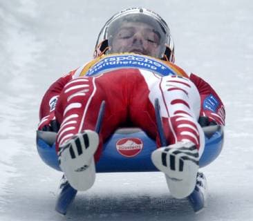 Der Italiener Armin Zoeggeler startet zum ersten Lauf beim Rodel-Weltcup-Rennen in Winterberg am Samstag, 17. Jan. 2004. Zoeggeler wbelegte Platz drei hinter den Deutschen Georg Hackl und David Moeller. In der Weltcup-Gesamtwertung fuehr er nach dem 6. Rennen mit 501 Punkten vor David Moeller mit 401 Punkten. ( Eckehard Schulz) -----Italy s Armin Zoeggeler starts to the first run of the Luge World Cup competition in Winterberg, Germany, Saturday, Jan. 17, 2004. He Hackl placed on third and leads the world cup standing. ( Eckehard Schulz) WINTERBERG DEU *** The Italian Armin Zoeggeler starts to the first run at the Toboggan World Cup race in Winterberg on Saturday 17 Jan 2004 Zoeggeler occupied third place behind the Germans Georg Hackl and David Moeller In the overall World Cup ranking he leads after the 6 race with 501 points David Moeller with 401 points Eckehard Schulz Italy s Armin Zoeggeler starts to the first run of the Luge World Cup competition in Winterberg Germany Saturday Jan 17 2004 He Hackl placed on third and leads the world cup standing Eckehard Schulz WINTERBERG DEU