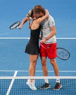 Angelique Kerber and Alexander Zverev hug after their victory Mixed Doubles Copyright: xJuergenxHasenkopfx
