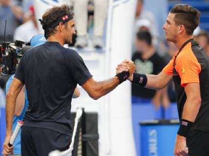 30th December 2018, RAC Arena, Perth, Australia; Hopman Cup Tennis, sponsored by Mastercard; Cameron Norrie of Team Great Britain congratulates Roger Federer of Team Switzerland on his straight sets win  ActionPlus12091732 DavidxWoodley