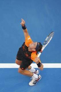30th December 2018, RAC Arena, Perth, Australia; Hopman Cup Tennis, sponsored by Mastercard; Cameron Norrie of Team Great Britain serves to Roger Federer of Team Switzerland  ActionPlus12091720 DavidxWoodley