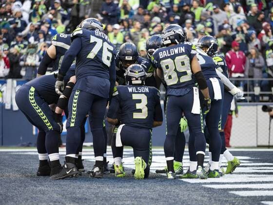 SEATTLE, WA - DECEMBER 30: Seattle Seahawks Quarterback Russell Wilson (3) leads a huddle during the NFL American Football Herren USA football game between the Arizona Cardinals and the Seattle Seahawks on December 30, 2018 at CenturyLink Field in Seattle, WA. (Photo by Joseph Weiser Icon Sportswire) NFL: DEC 30 Cardinals at Seahawks Icon181230161 EDITORIAL USE ONLY