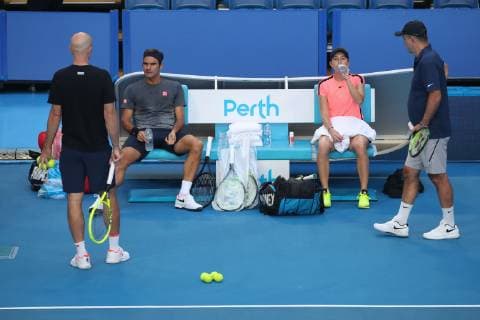 Training break L R coach Ivan Ljubicic Roger Federer Belinda Bencic and father coach Ivan Bencic Training Copyright: xJuergenxHasenkopfx