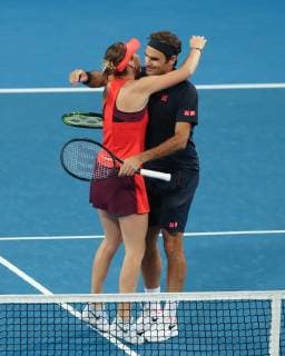Belinda Bencic and Roger Federer embrace after their victory Mixed Double Copyright: xJuergenxHasenkopfx