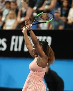 Serena Williams stretches her arms up and cheers cheers joy emotion Copyright: xJuergenxHasenkopfx