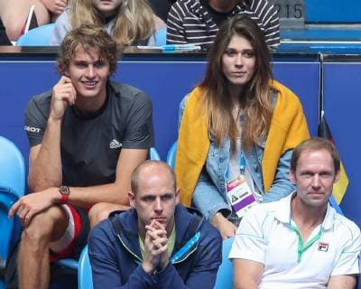 Team Germany Alexander Zverev sits with Olya Sharypova in the players box and follows the game R L Angelique Kerber coach Rainer Schuettler and physiotherapist Andre Kreidler sit in the front seat Copyright: xJuergenxHasenkopfx