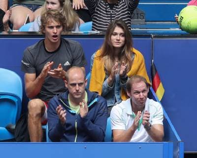 Team Germany Alexander Zverev sits with Olya Sharypova in the players box and follows the game R L Angelique Kerber coach Rainer Schuettler and physiotherapist Andre Kreidler sit in the front seat Copyright: xJuergenxHasenkopfx
