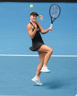 Angelique Kerber jumps up to hit the ball Mixed Doubles Copyright: xJuergenxHasenkopfx