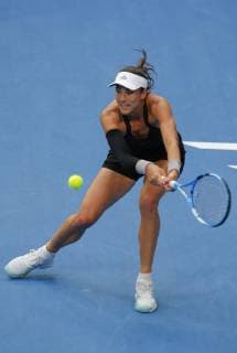 2nd January 2019, RAC Arena, Perth, Australia; Hopman Cup Tennis, sponsored by Mastercard; Garbine Muguruza of Team Spain plays a backhand shot against Ashleigh Barty of Team Australia  ActionPlus12092347 DavidxWoodley