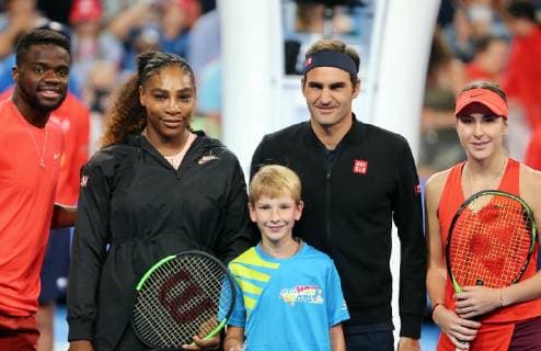 (190102) -- BEIJING, Jan. 2, 2019 -- (R-L) Belinda Bencic and Roger Federer of Switzerland, Serena Williams and Frances Tiafoe of the United States pose for photos before their mixed doubles match at the Hopman Cup in Perth, Australia, Jan. 1, 2019. The Swiss pair won by 2-0. ) XINHUA PHOTOS OF THE DAY XINHUA PHOTOS OF THE DAY ZhouxDan 