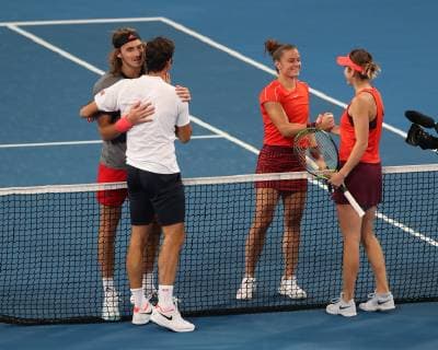 Roger Federer and Belinda Bencic congratulate Maria Sakkari and Stefanos Tsitsipas on their victory Jubel Freude Emotion Mixed Doubles Copyright: xJuergenxHasenkopfx