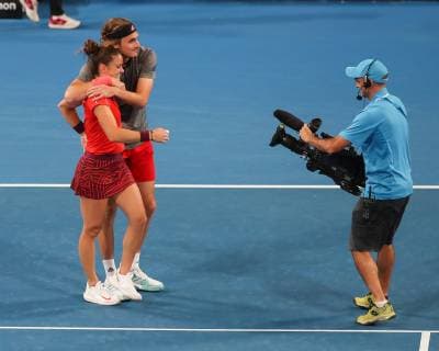 Maria Sakkari and Stefanos Tsitsipas cheer after their victory Jubel Freude Emotion Mixed Doubles Copyright: xJuergenxHasenkopfx
