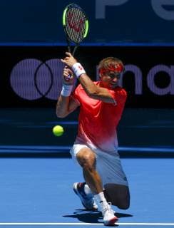 4th January 2019, RAC Arena, Perth, Australia; Hopman Cup Tennis, sponsored by Mastercard; David Ferrer of Team Spain hits a low running plays a backhand shot against Lucas Pouille of Team France  ActionPlus12092800 DavidxWoodley