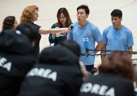 The South Korean and captain Suyoung Jung and the North Korean Song Jin Ri l r during a press conference in the Handball Hall Public training of the joint handball team from North and South Korea in preparation for the Handball World Championship 2019 in DEN GER in the Horst Kober Sports Center in Berlin Germany on 04 01 2019