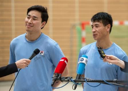 The South Korean and captain Suyoung Jung and the North Korean Song Jin Ri l r during a press conference in the Handball Hall Public training of the joint handball team from North and South Korea in preparation for the Handball World Championship 2019 in DEN GER in the Horst Kober Sports Center in Berlin Germany on 04 01 2019