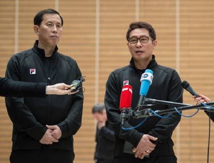 Coach Myong Chol Sin and head coach Young Shin Cho l r during a press conference in the Handball Hall Public training of the joint handball team from North and South Korea in preparation for the Handball World Championship 2019 in DEN GER at the Horst Kober Sports Centre in Berlin Germany on 04 01 2019