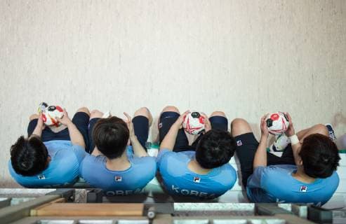 After the training players of the team sit together in the handball hall Public training of the joint handball team from North and South Korea in preparation for the Handball World Championship 2019 in DEN GER in the Horst Kober Sports Centre in Berlin Germany on 04 01 2019
