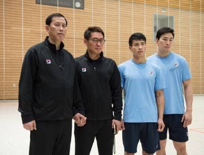 Coach Myong Chol Sin head coach Young Shin Cho the South Korean player and captain Suyoung Jung as well as the North Korean player Song Jin Ri l r pose for a photo coach Myong Chol Sin and head coach Young Shin Cho hold together the hand handball public training of the joint handball team from North and South Korea in preparation for the Handball World Championship 2019 in DEN GER at the Horst Kober Sports Center in Berlin Germany on 04 01 2019