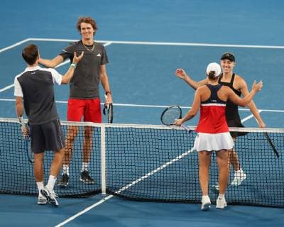 Matthew Ebden and Ashleigh Barty congratulate the winners Angelique Kerber and Alexander Zverev Mixed Doubles Copyright: xJuergenxHasenkopfx