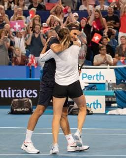 Belinda Bencic Roger Federer hug each other and cheer joy joy emotion mixed doubles finals final Copyright: xJuergenxHasenkopfx