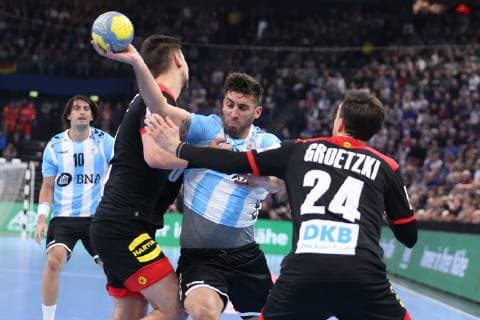Germany vs Argentina Handball international 06 01 19 Nicolas Bomanno Argentina 77 vs Patrick Groetzki Germany 24 and Fabian Wiede Germany 10 xmmkx