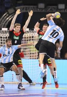 Photo Defense of Finn Lemke Germany and Martin Strobel against Federico Vieyra Handball international on So 06 01 2019 in Kiel Germany Argentina