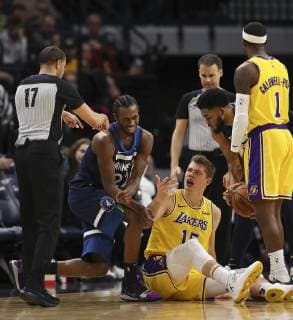January 6, 2019 - Minneapolis, MN, USA - Referee Jonathan Sterling calls a jump ball between Minnesota Timberwolves forward Andrew Wiggins (22) and Los Angeles Lakers center Moritz Wagner (15) in the second half on Sunday, Jan. 6, 2019 at Target Center in Minneapolis, Minn. The Minnesota Timberwolves defeated the Los Angeles Lakers, 108-86. Los Angeles Lakers vs. Minnesota Timberwolves - ZUMAm67_ 20190106_zaf_m67_013 Copyright: xJeffxWheelerx