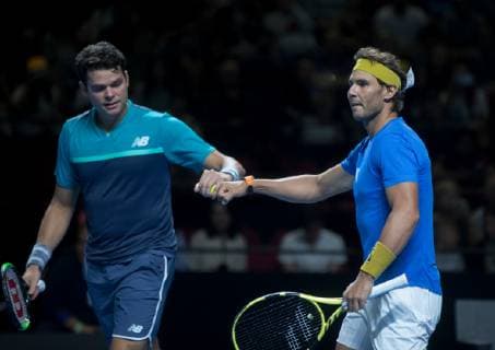 (190107) -- SYDNEY, Jan. 7, 2019 (Xinhua) -- Rafael Nadal (R) of Spain and Milos Raonic of Canada react during the men s double match against Nick Kyrgios and John Millman of Australia at Fast4 Showdown in 2019 Sydney Tennis Open in Sydney, Australia, Jan. 7, 2019. Rafael Nadal and Milos Raonic won 2-1. (Xinhua Zhu Hongye) (SP)AUSTRALIA-SYDNEY-TENNIS-SYDNEY OPEN-FAST4 