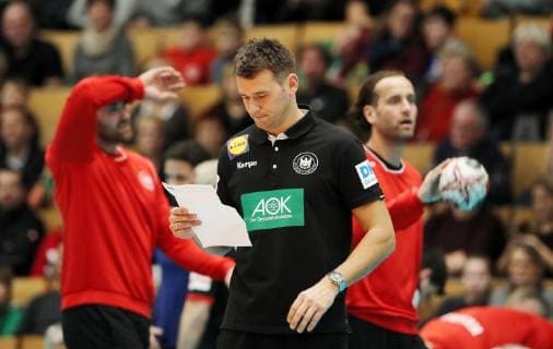 Coach Christian Prokop behind goalkeeper Andreas Wolff goalkeeper Silvio Heinevetter public training in the run-up to the World Championships in Germany and Denmark Sport Handball DHB National Team Men Season 2018 2019 08 01 2019 GER BRDeutschland