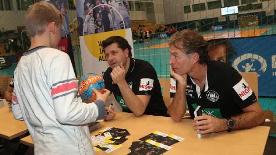Co coach Alexander Haase and physiotherapist Peter Graeschus at the autograph session after the open training of the German national team before the mens handball world championship 2019 on 08 01 2019 in the gym of the sports forum in Berlin Handball world championship 2019 preparation open training of the national team