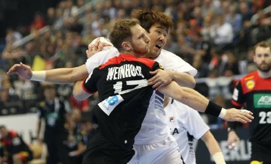 Steffen Weinhold Germany vs. KIM Dongmyung Korea at the opening match Korea vs. Germany of the Mens Handball World Championship 2019 on 10 01 2019 in the Mercedes Benz Arena in Berlin Handball World Championship 2019 Group A Korea vs. Germany