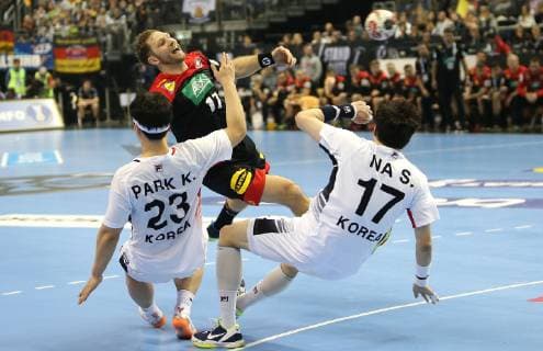 Steffen Weinhold Germany vs. PARK Kwangsoon Korea l and NA Seungdo Korea r at the opening match Korea vs. Germany of the Mens Handball World Championship 2019 on 10 01 2019 in the Mercedes Benz Arena in Berlin Handball World Championship 2019 Group A Korea vs Germany