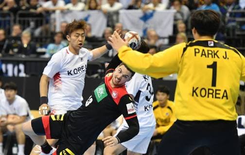 Hendrik Pekeler Germany throw right left Jaewan Jeong Korea right Jaeyong Park Goalkeeper Korea Korea Germany Korea Germany IHF Handball World Championship 2019 Hanball World Championship 2019 Men Men Men Handball men Handball Germany Germany Preliminary Round Group A group A Berlin 10 1 2019
