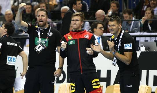 Team manager Oliver Roggisch Franz Semper Germany and national coach Christian Prokop Germany cheering on team manager Oliver Roggisch Franz Semper Germany at the opening match Korea against Germany of the mens Handball World Championship 2019 on 10 01 2019 in the Mercedes Benz Arena in Berlin Handball World Championship 2019 Group A Korea vs Germany