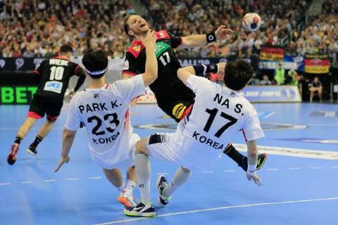 Germany Berlin Mercedes Benz Arena IHF Mens Handball World Championship Germany 17 Steffen Weinhold GER Korea Kwangsoon Park Seungdo Na KOR