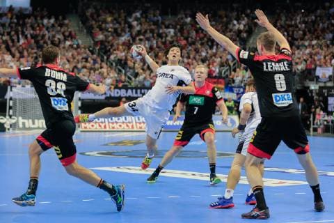 Germany Berlin Mercedes Benz Arena IHF Mens Handball World Championship Germany 38 Fabian Boehm Finn Lemke GER Korea 34 Jeongu Kang KOR