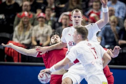 Simon Hald Jensen of Denmark and Lasse Svan of Denmark during the men s IHF Handball World Championship Group C match against Chile in Copenhagen Denmark on Thursday Jan 10 2019 Copenhagen Denmark, detectedSourceLanguage  Copyright: RitzauxScanpix MadsxClausxRasmussenx Cop101 spdk20190110-220722-L