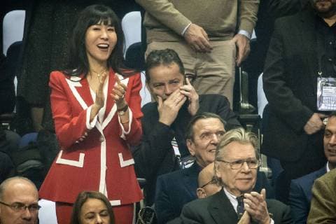 Germany vs Korea Handball World Championship 2019 10 01 2019 Former Chancellor Gerhard Schröder sitting with his 5 wife Soyeon Kim red dress in the stands at the match between Germany and Korea at the Handball World Championship in Berlin on 10 01 2019 Berlin BER Germany Mercedes Benz Arena