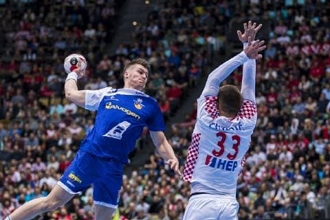 Munich Germany 11 January 2019 World Cup 2019 Men Group B Island vs Croatia v li Elvar Orn Jonsson Island Luka Cindric Croatia Munich Olympic Hall Bayern Germany