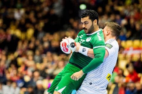 190111 Mohammed Alabas of Saudi Arabia and Lukas Herburger of Austria during the 2019 IHF World Championship match between Saudi Arabia and Austria on January 11 2019 in Herning Photo Jon Olav Nesvold BILDBYR u0081N kod JE 160393, detectedSourceLanguage  Copyright: JONxOLAVxNESVOLD BB190111JE063