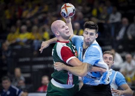 Zsolt Balogh of Hungary and Nicolas Bonanno of Argentina during the men s IHF Handball World Championship match in Group D between Argentina Hungary in Copenhagen Denmark on Friday Jan 11 2019 Copenhagen Denmark, detectedSourceLanguage  Copyright: Scanpix LiselottexSabroex COP101 spdk20190111-194845-L