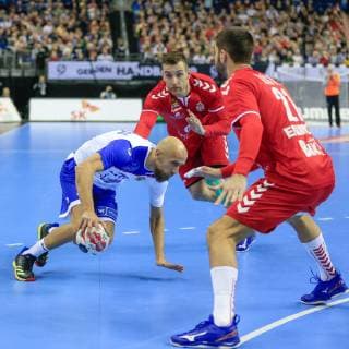Germany Berlin Mercedes Benz Arena IHF Mens Handball World Championship Serbia Stefan Vujic 21 Vanja Ilic SRB Russia 31 Timur Dibirov RUS